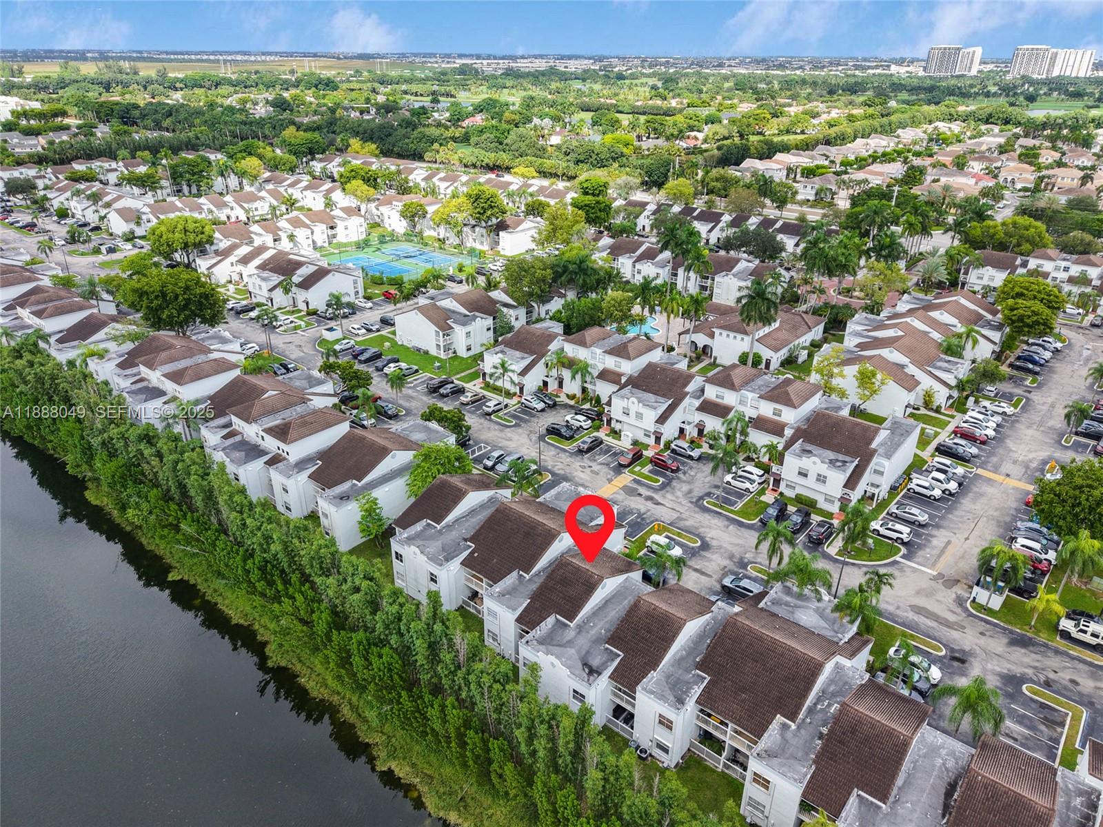 4624 Northwest 97th Place, Unit 252 Doral, FL 33178 - Photo 23 of 28 an aerial view of residential houses with outdoor space and street view