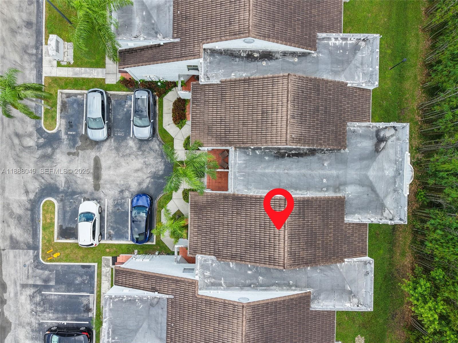 4624 Northwest 97th Place, Unit 252 Doral, FL 33178 - Photo 25 of 28 an aerial view of residential houses with outdoor space