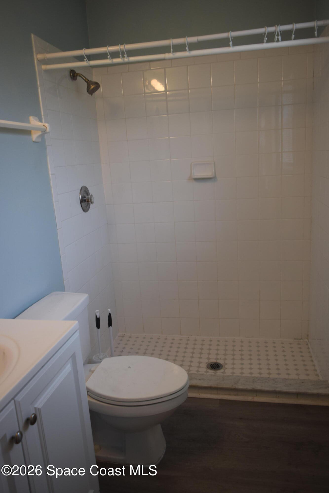 213 Abello Road Southeast Palm Bay, FL 32909 - Photo 16 of 23 a bathroom with a toilet and a shower