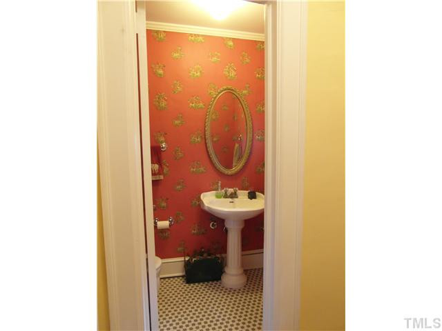 2216 St Marys Street Raleigh, NC 27608 - Photo 12 of 25 Beautiful first floor half bath featuring gorgeous tiled floors and a pedestal sink~