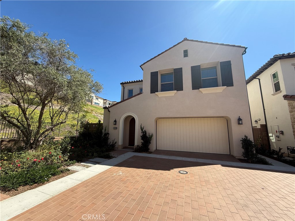 228 Maricopa Irvine, CA 92618 - Photo 1 of 1 a front view of a house with a yard