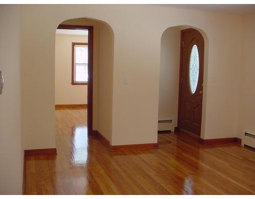 540 Ryan Road Northampton, MA 01062 - Photo 5 of 8 a view of a room with wooden floor and glass door