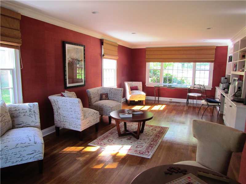 115 Long Neck Point Road Darien, CT 06820 - Photo 12 of 21 a living room with furniture wooden floor and a large window
