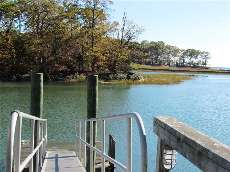 115 Long Neck Point Road Darien, CT 06820 - Photo 3 of 21 a view of a lake from a balcony