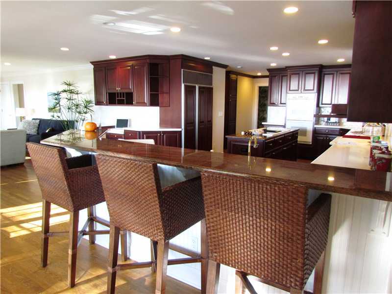 115 Long Neck Point Road Darien, CT 06820 - Photo 6 of 21 a living room with furniture and a wooden floor