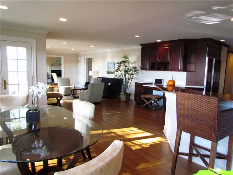 115 Long Neck Point Road Darien, CT 06820 - Photo 8 of 21 a living room with dining room and kitchen view