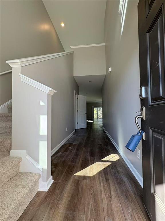 169 Wynn Way Pendergrass, GA 30567 - Photo 2 of 25 a view of a hallway with wooden floor