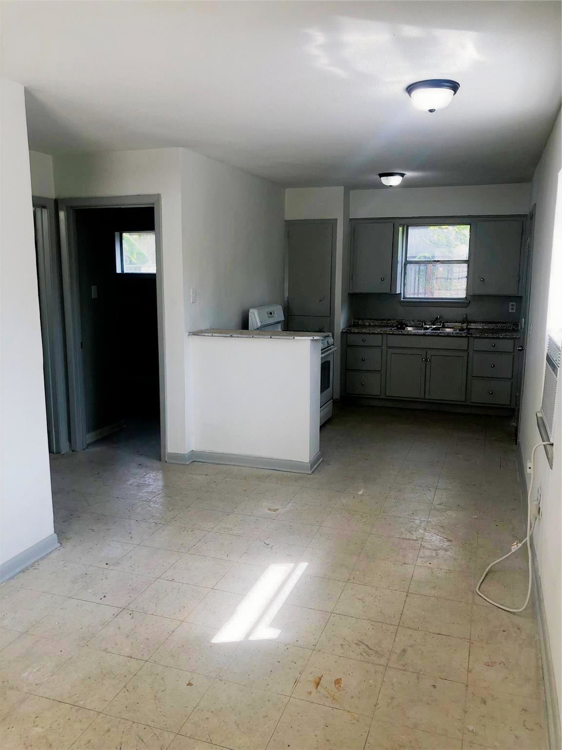 404 James Houston, TX 77009 - Photo 4 of 11 a view of room with kitchen