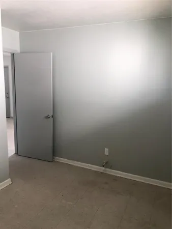 an empty room with closet