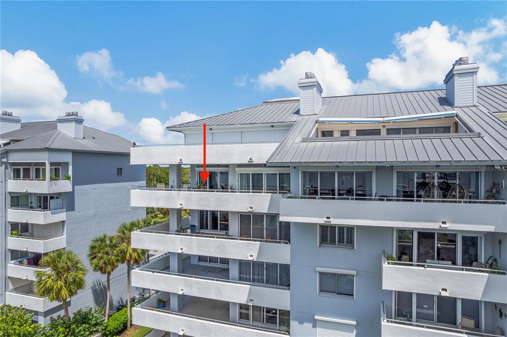 1000 Riverside Drive, Unit B504 Palmetto, FL 34221 - Photo 15 of 48 a front view of a building with a lot of white walls