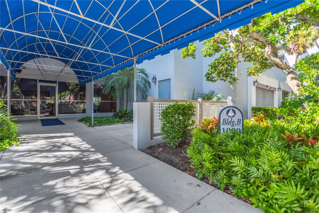 1000 Riverside Drive, Unit B504 Palmetto, FL 34221 - Photo 21 of 48 a view of a backyard with potted plants