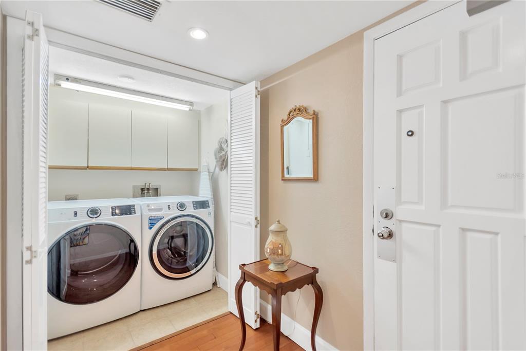 1000 Riverside Drive, Unit B504 Palmetto, FL 34221 - Photo 22 of 48 a utility room with dryer and washer