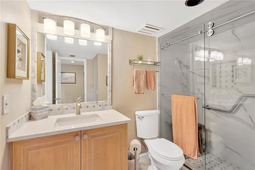 1000 Riverside Drive, Unit B504 Palmetto, FL 34221 - Photo 24 of 48 a bathroom with a sink a toilet and shower