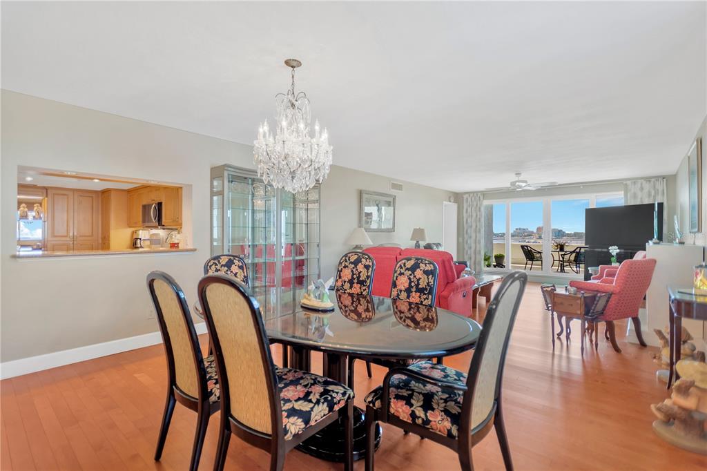 1000 Riverside Drive, Unit B504 Palmetto, FL 34221 - Photo 26 of 48 a view of a dining room with furniture and chandelier