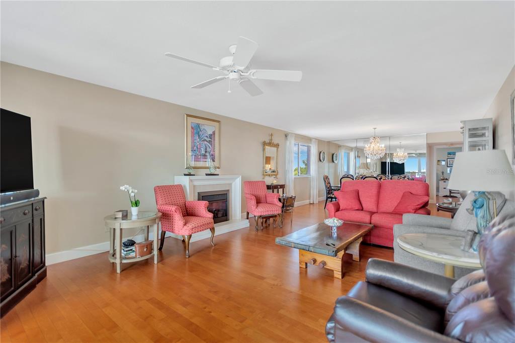 1000 Riverside Drive, Unit B504 Palmetto, FL 34221 - Photo 30 of 48 a living room with furniture and a flat screen tv