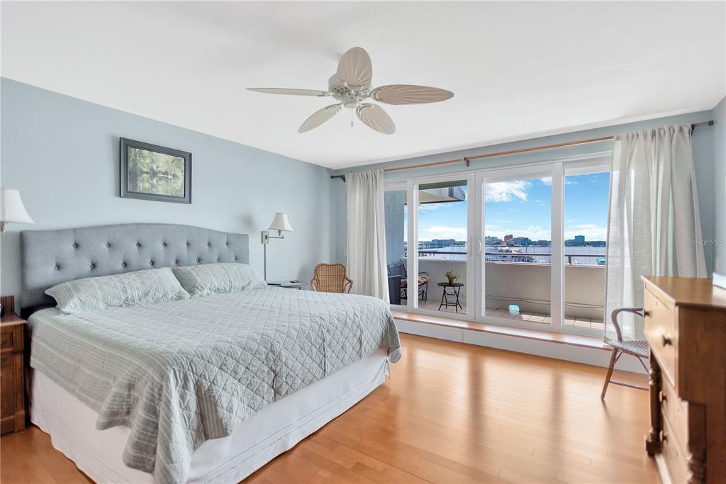 1000 Riverside Drive, Unit B504 Palmetto, FL 34221 - Photo 33 of 48 a spacious bedroom with a bed and a large window