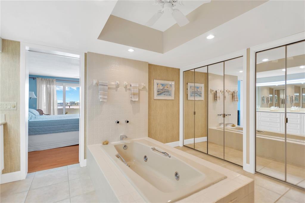 1000 Riverside Drive, Unit B504 Palmetto, FL 34221 - Photo 36 of 48 a bathroom with a bathtub shower and a sink