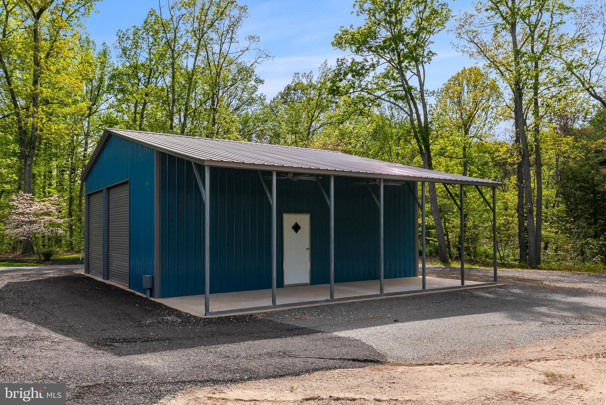 5553 Beverleys Mill Road Broad Run, VA 20137 - Photo 16 of 80 a view of a house with a backyard