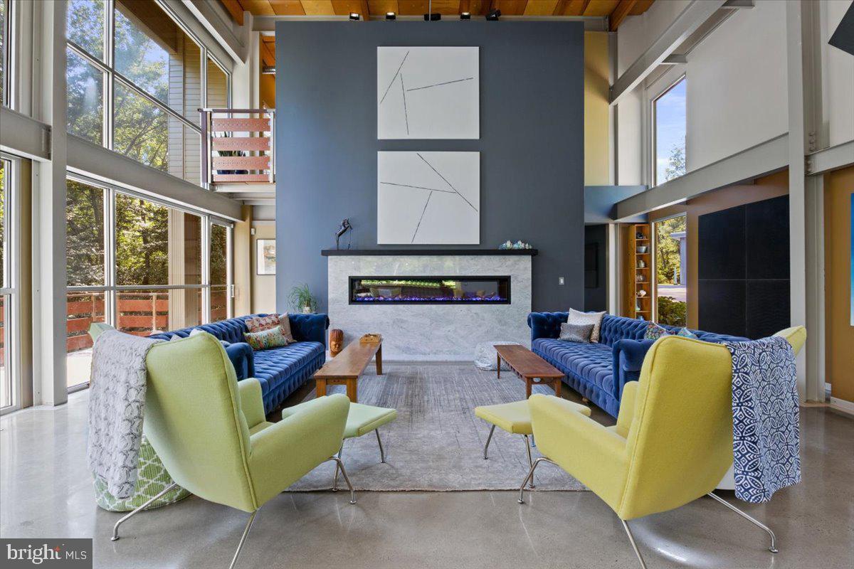 5553 Beverleys Mill Road Broad Run, VA 20137 - Photo 26 of 80 a living room with fireplace furniture and a large window