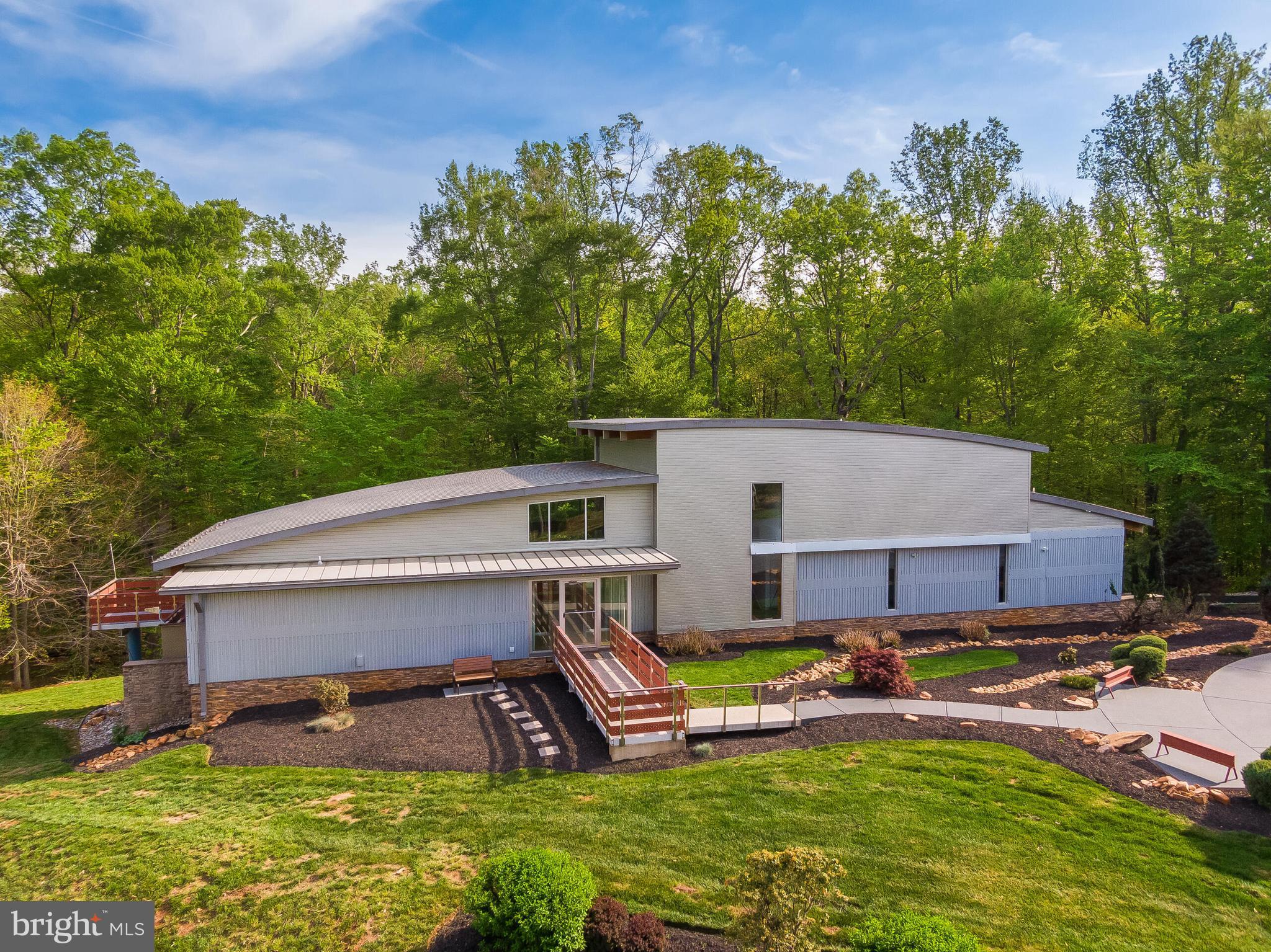 5553 Beverleys Mill Road Broad Run, VA 20137 - Photo 52 of 80 a view of a house with backyard and sitting area