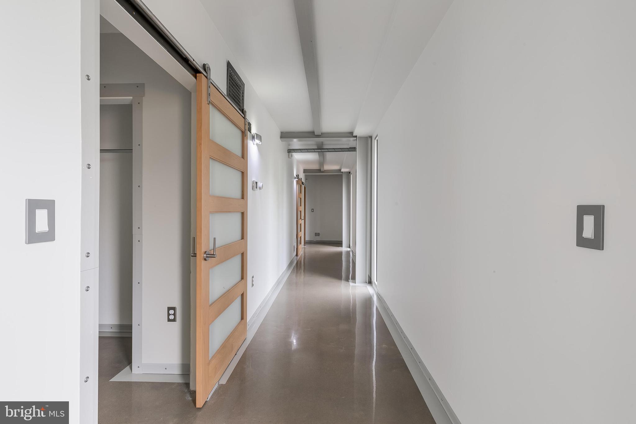5553 Beverleys Mill Road Broad Run, VA 20137 - Photo 54 of 80 a view of a hallway with wooden floor and entryway