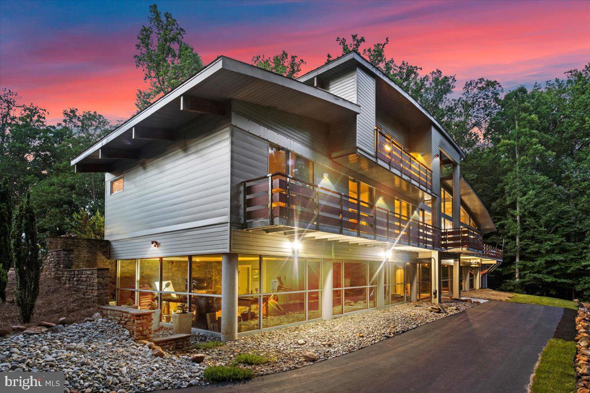 5553 Beverleys Mill Road Broad Run, VA 20137 - Photo 6 of 80 a view of a building with a yard