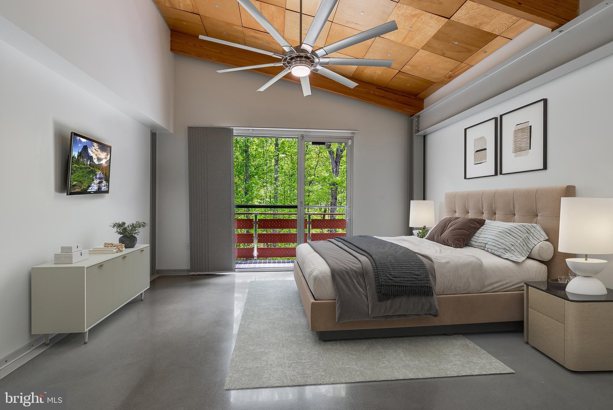 5553 Beverleys Mill Road Broad Run, VA 20137 - Photo 64 of 80 a spacious bedroom with a bed and a couch