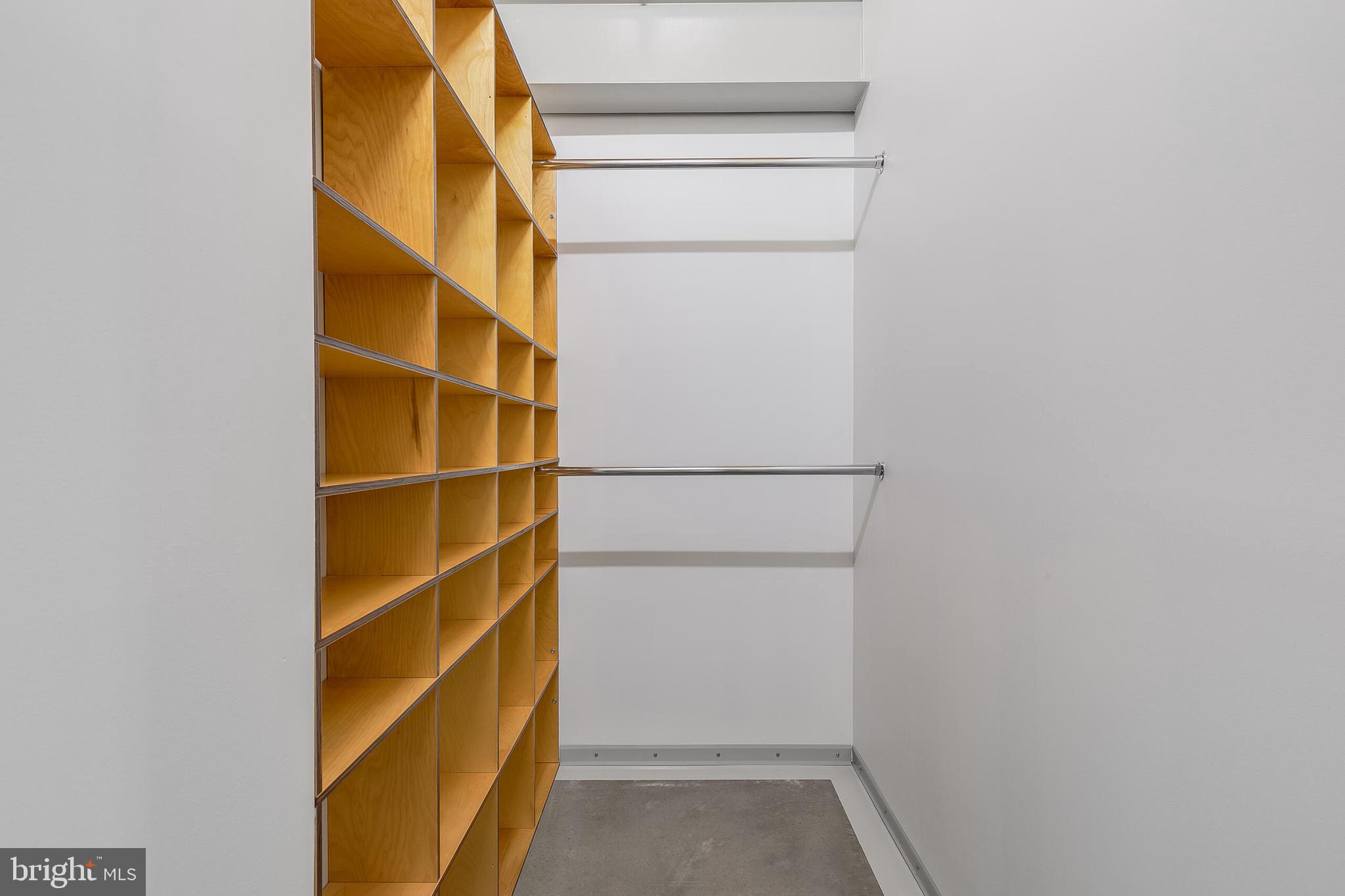 5553 Beverleys Mill Road Broad Run, VA 20137 - Photo 66 of 80 a view of walk in closet with empty racks