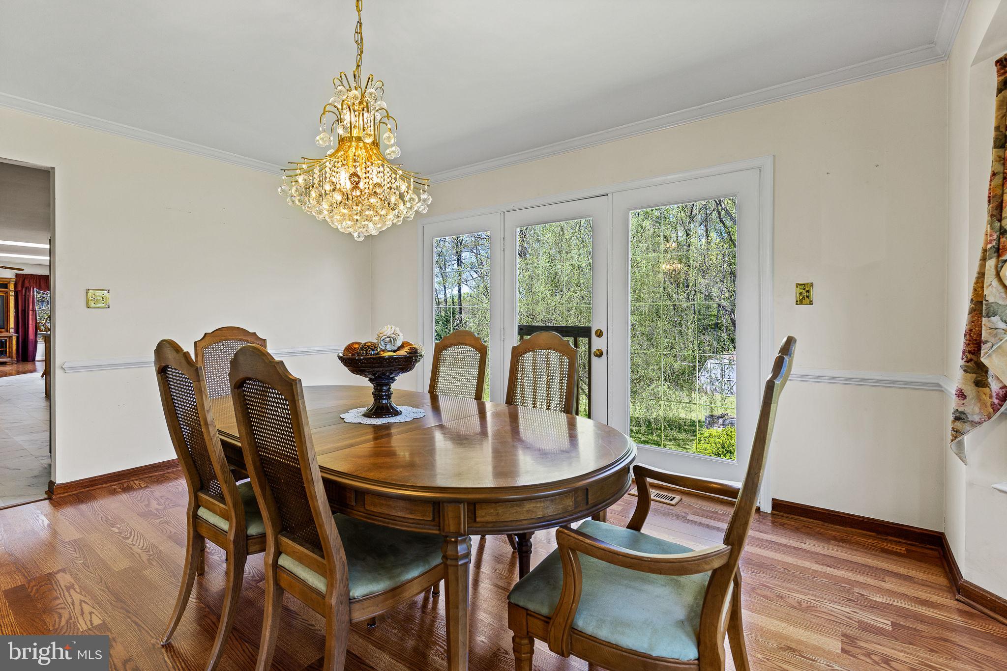 219 Kellogg Mill Road Fredericksburg, VA 22406 - Photo 14 of 47 Formal dining room with oversized windows & door