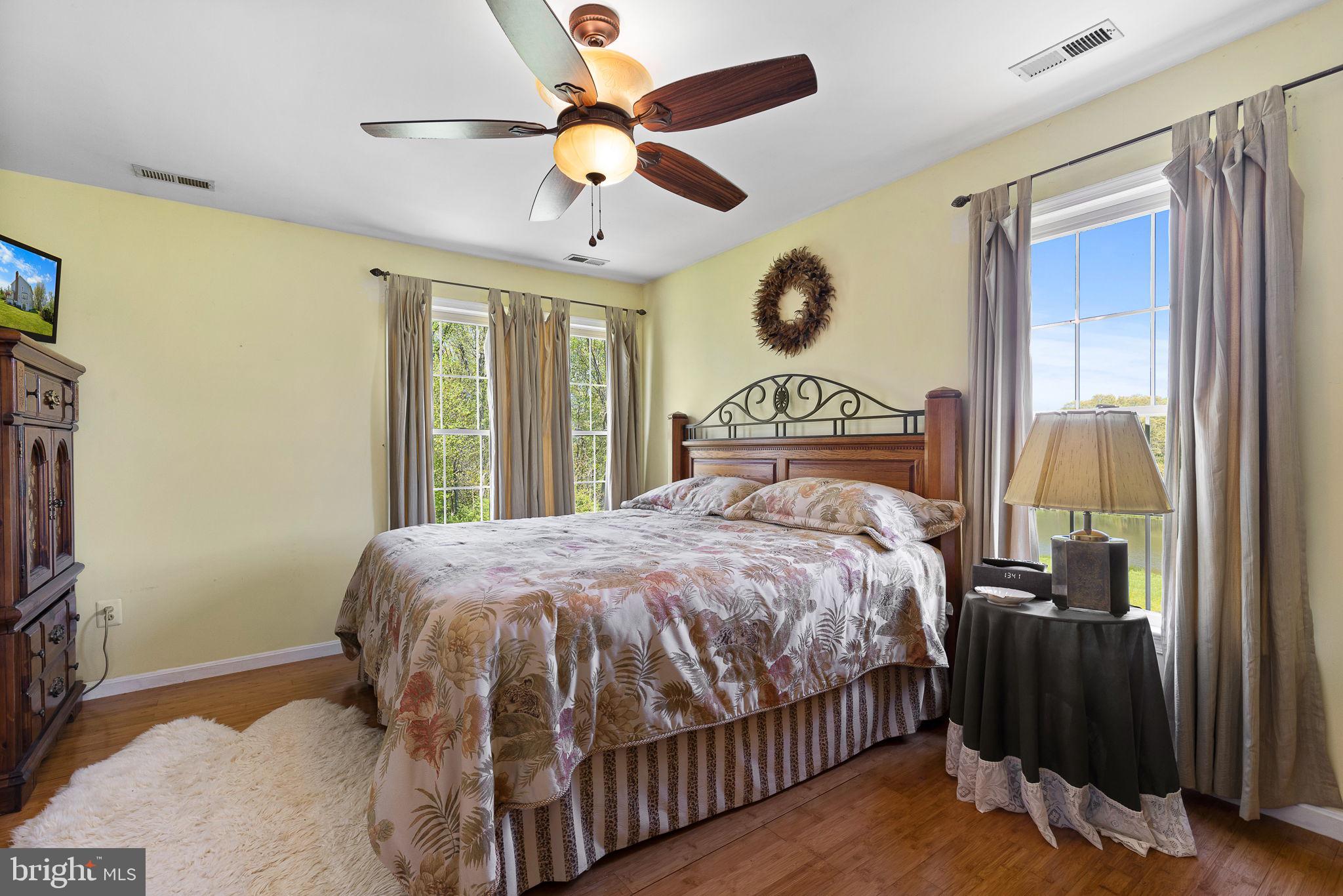 219 Kellogg Mill Road Fredericksburg, VA 22406 - Photo 24 of 47 Primary bedroom with hardwood flooring