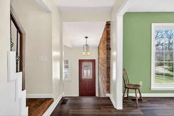 a view of front door with stairs