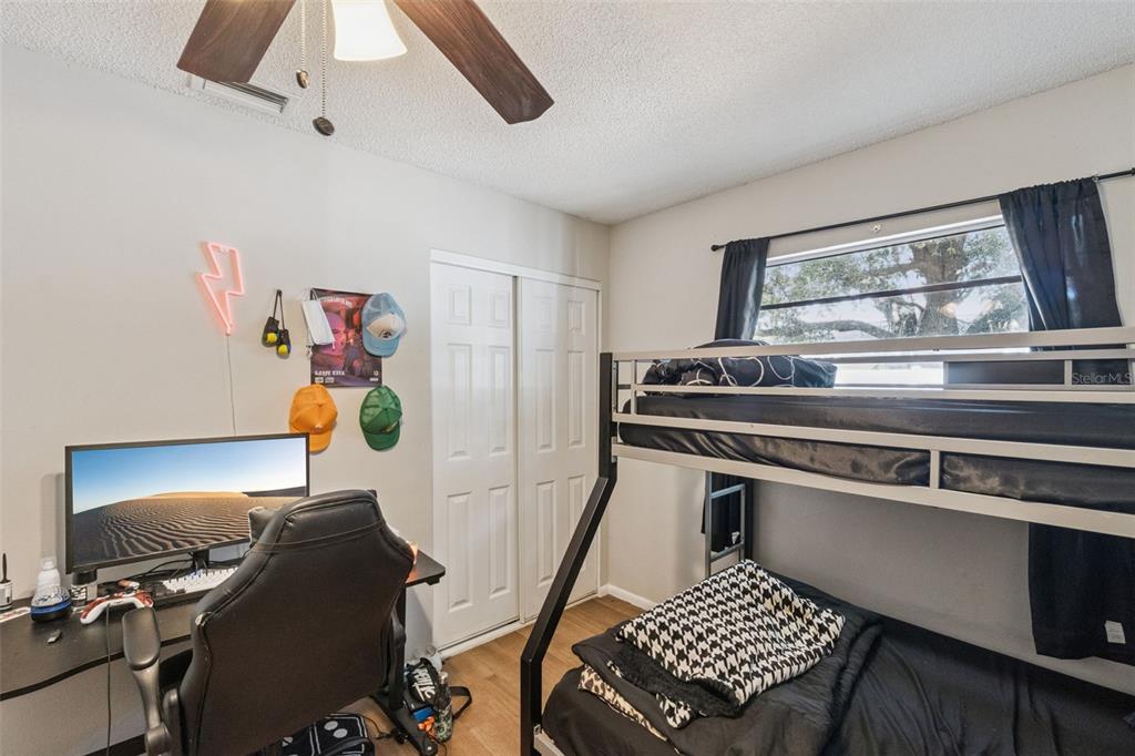 4608 Frisco Circle Orlando, FL 32808 - Photo 16 of 26 a view of a workspace with furniture and a window