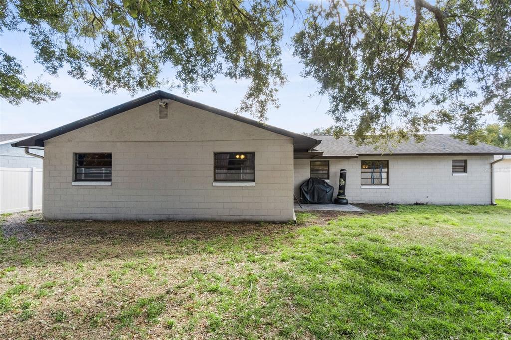 4608 Frisco Circle Orlando, FL 32808 - Photo 21 of 26 a view of a backyard of the house