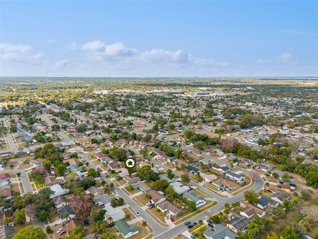 4608 Frisco Circle Orlando, FL 32808 - Photo 24 of 26 an aerial view of residential building and lake