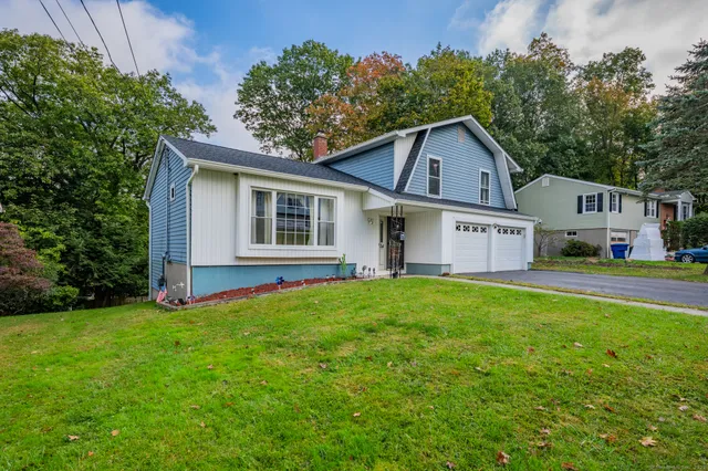 a house view with a garden space