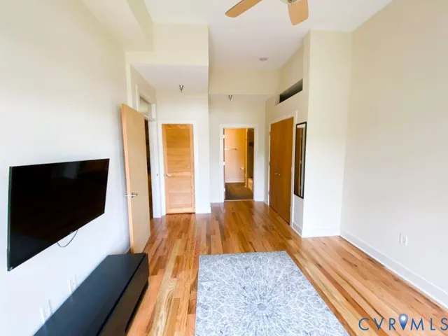 a view of a living room with a flat screen tv