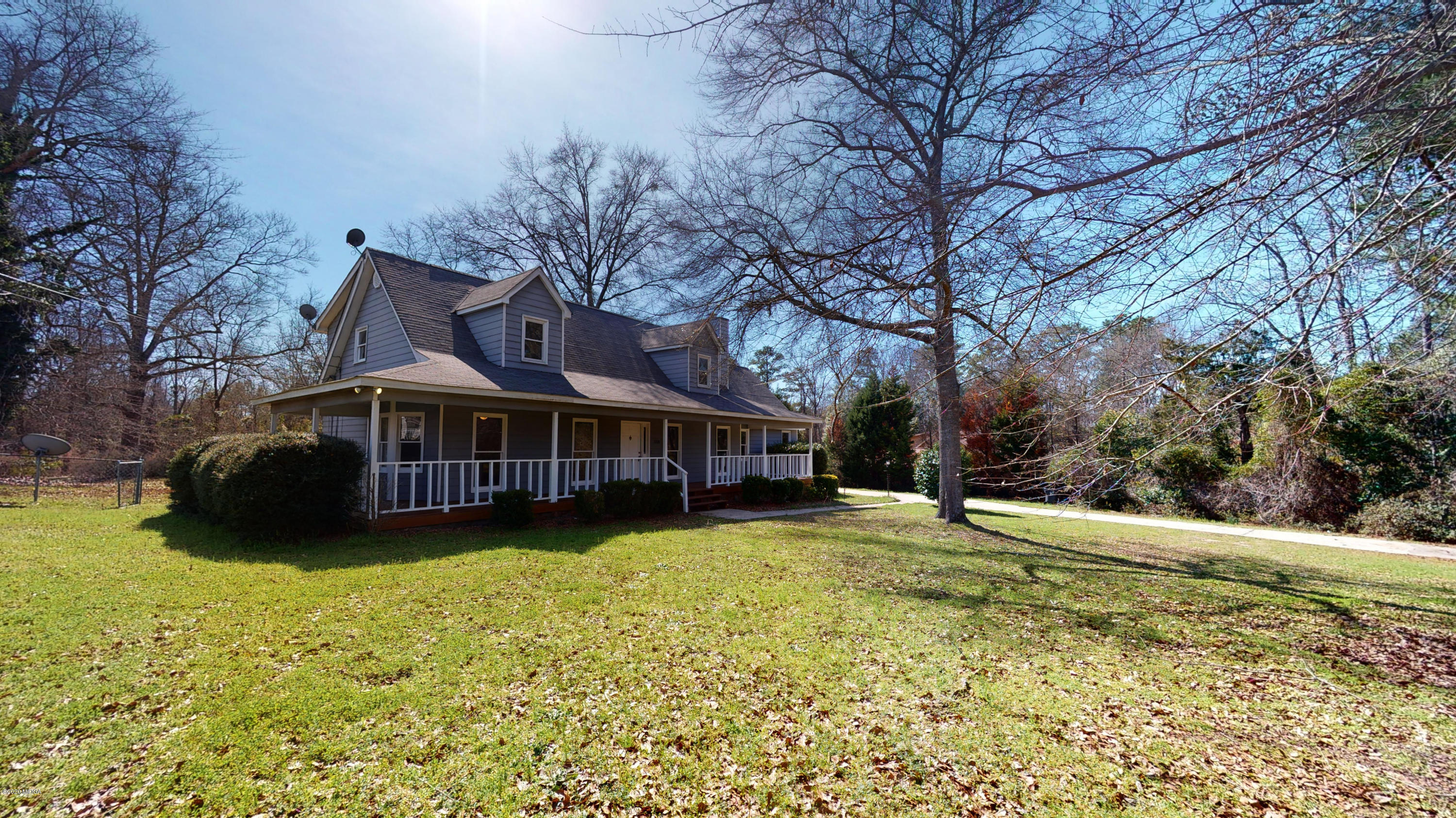 7228 Columbus Road Lizella, GA 31052 - Photo 1 of 41 a view of a house with yard and sitting area