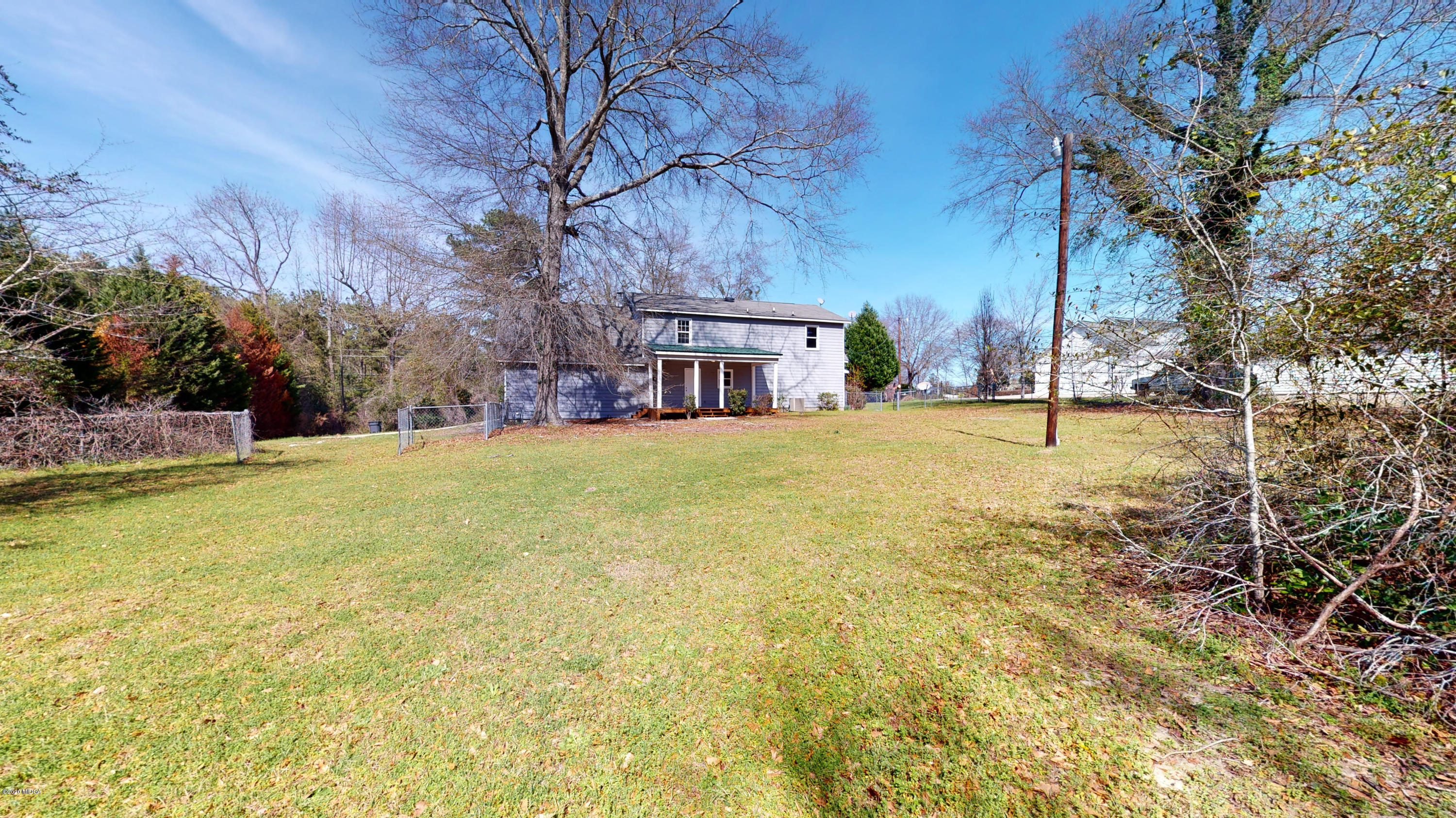 7228 Columbus Road Lizella, GA 31052 - Photo 34 of 41 a view of a swimming pool and trees in the background