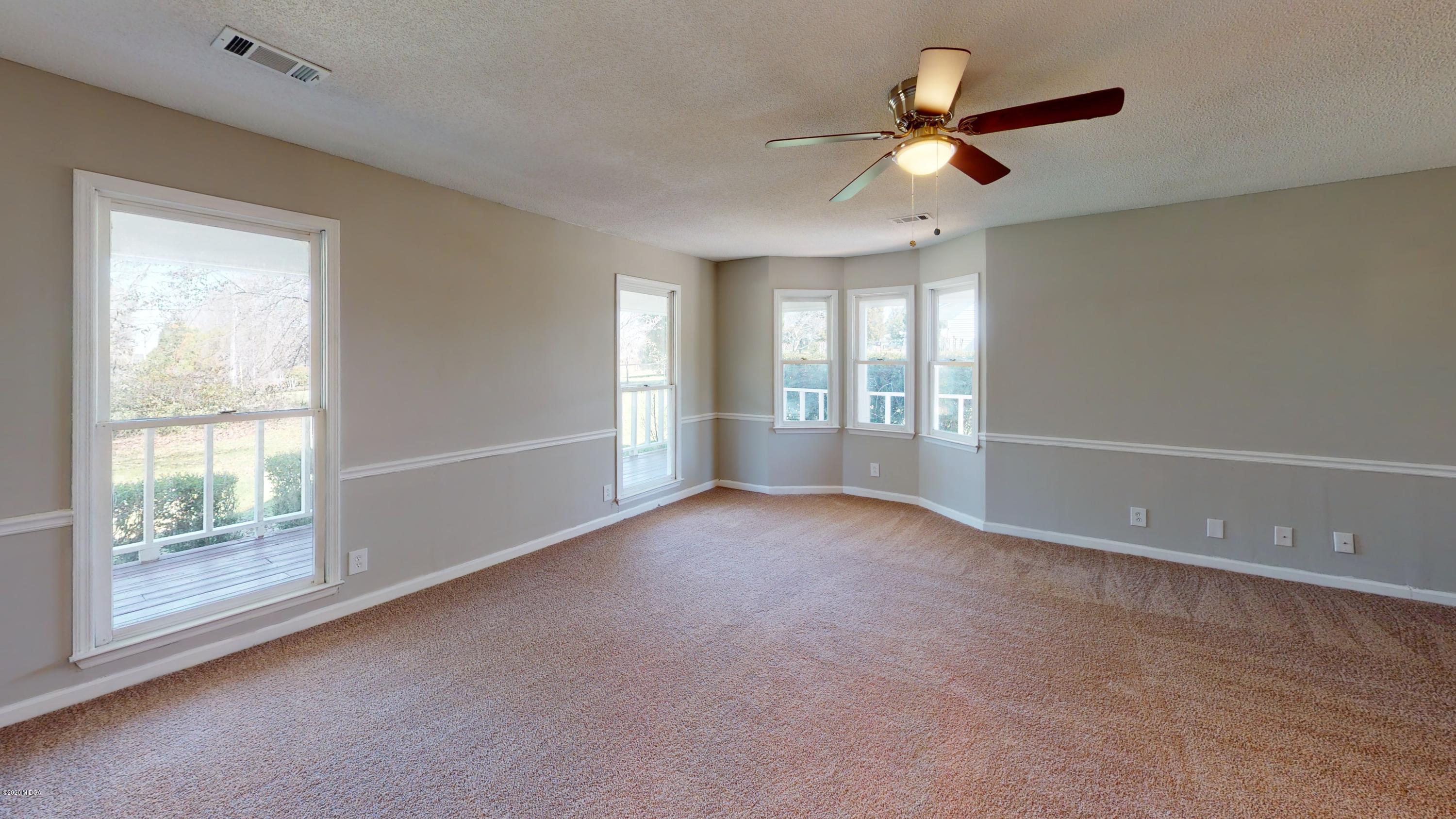 7228 Columbus Road Lizella, GA 31052 - Photo 41 of 41 a view of an empty room with a window
