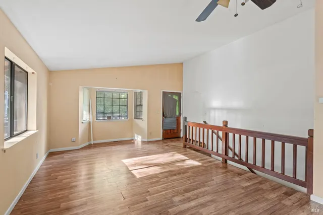 a view of livingroom with furniture wooden floor and window