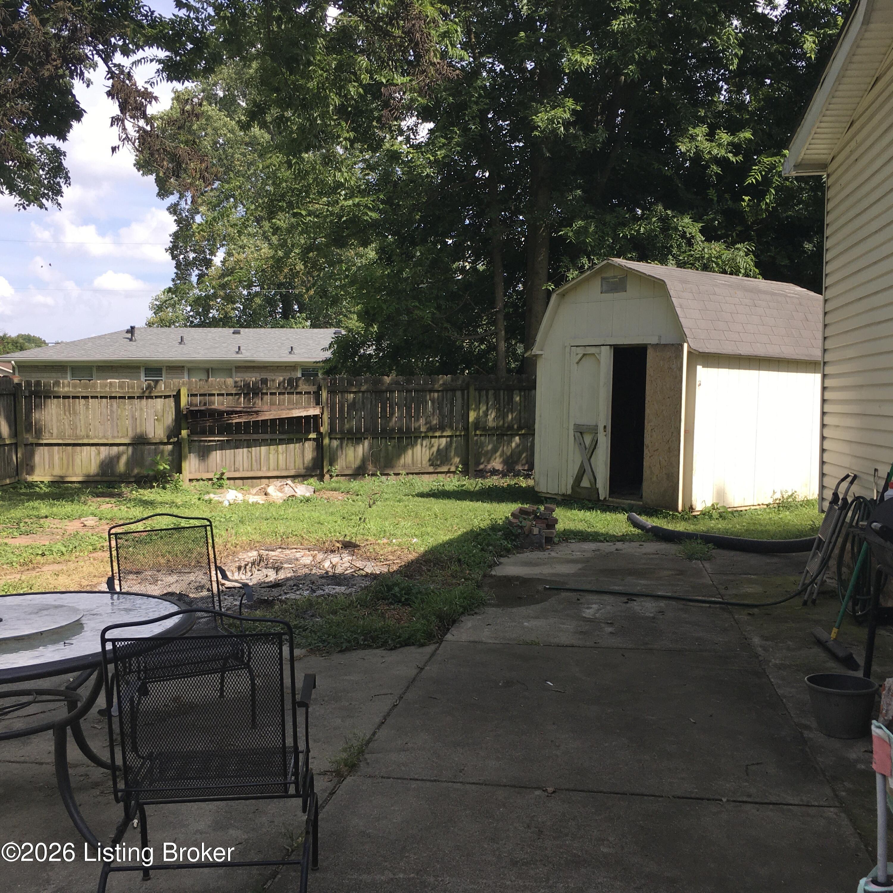 5111 Terry Road Louisville, KY 40216 - Photo 14 of 14 Nice private yard with shed