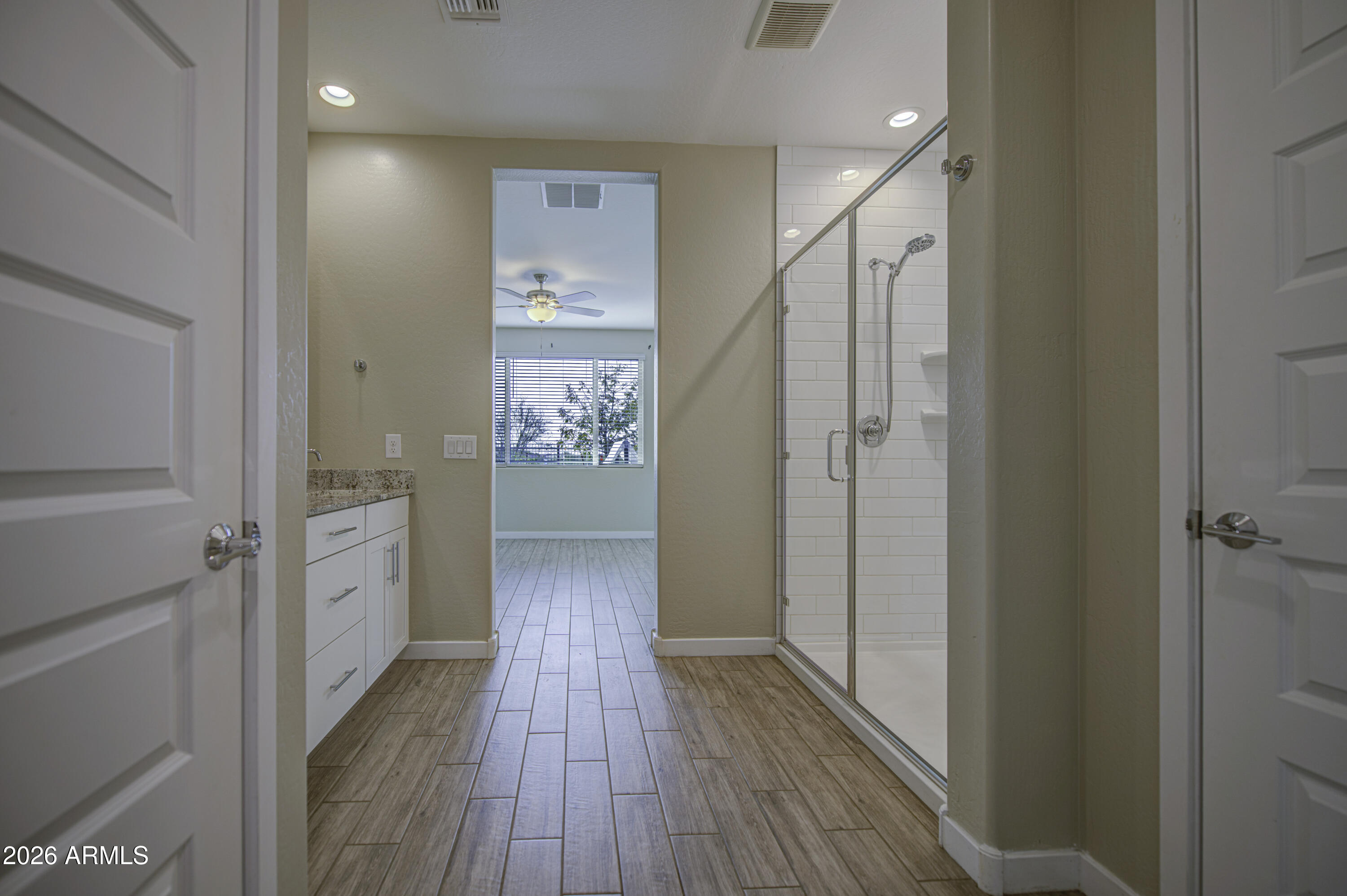 12409 East Soloman Road Gold Canyon, AZ 85118 - Photo 23 of 48 a view of a hallway with wooden floor