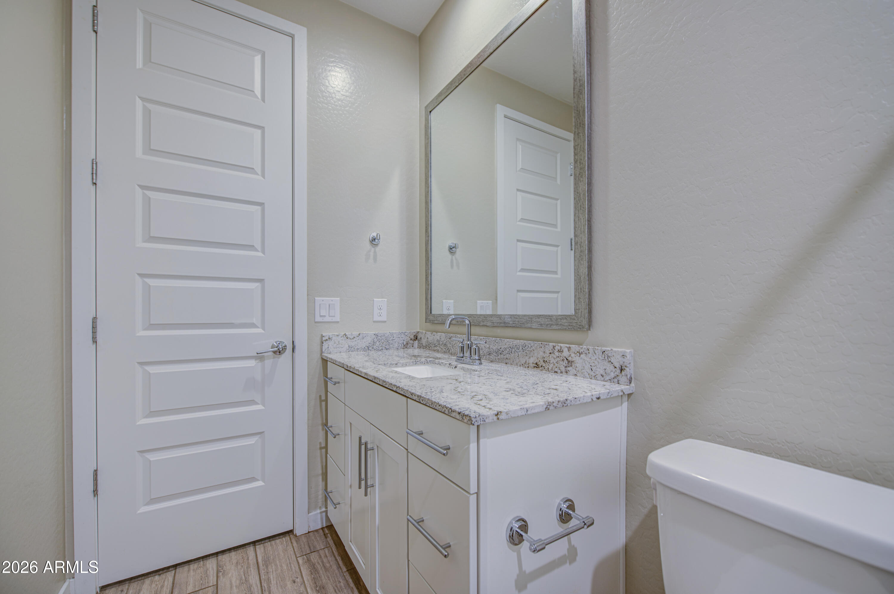 12409 East Soloman Road Gold Canyon, AZ 85118 - Photo 36 of 48 a bathroom with a granite countertop sink and a mirror