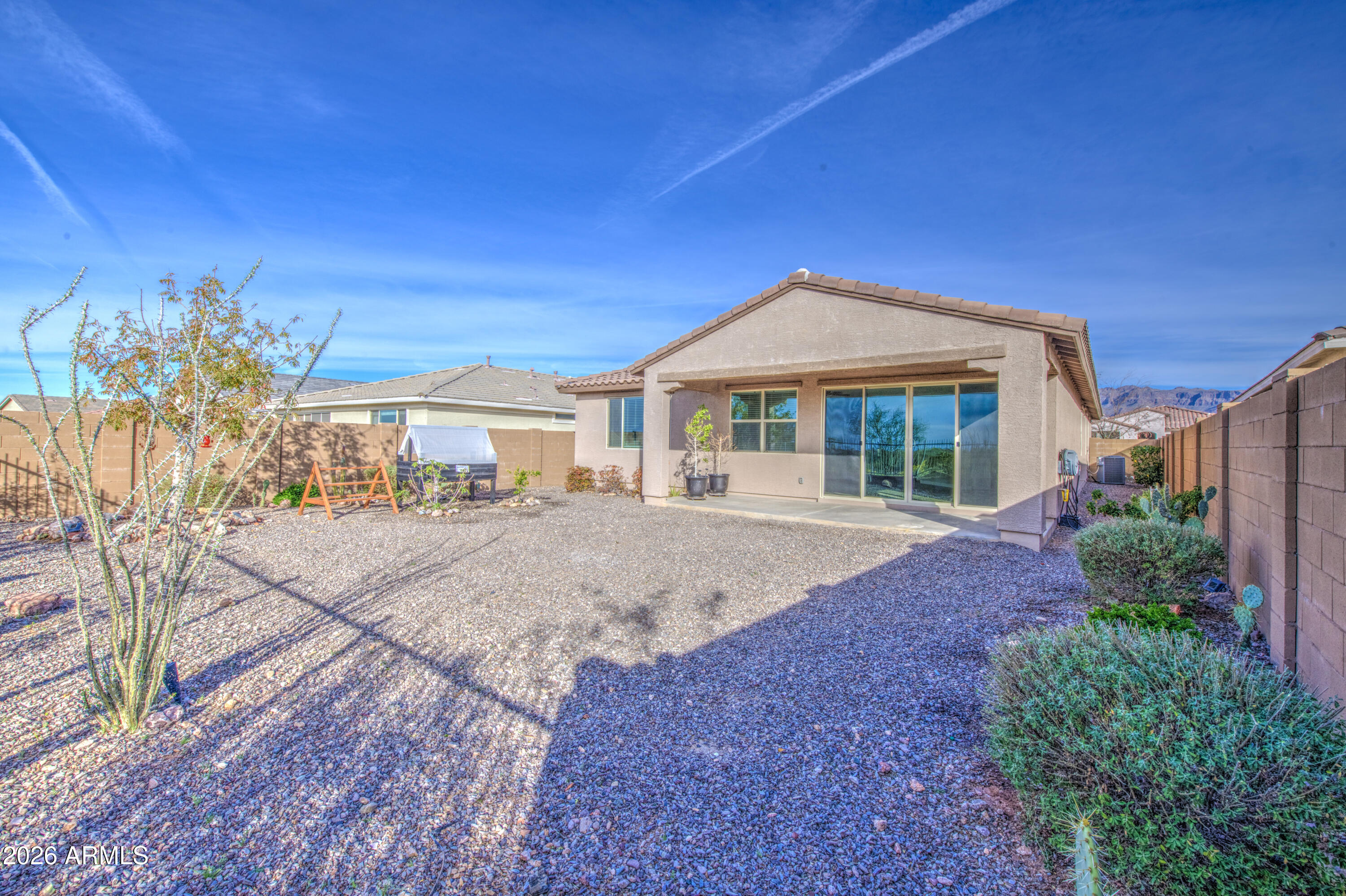 12409 East Soloman Road Gold Canyon, AZ 85118 - Photo 43 of 47 a front view of a house with a yard