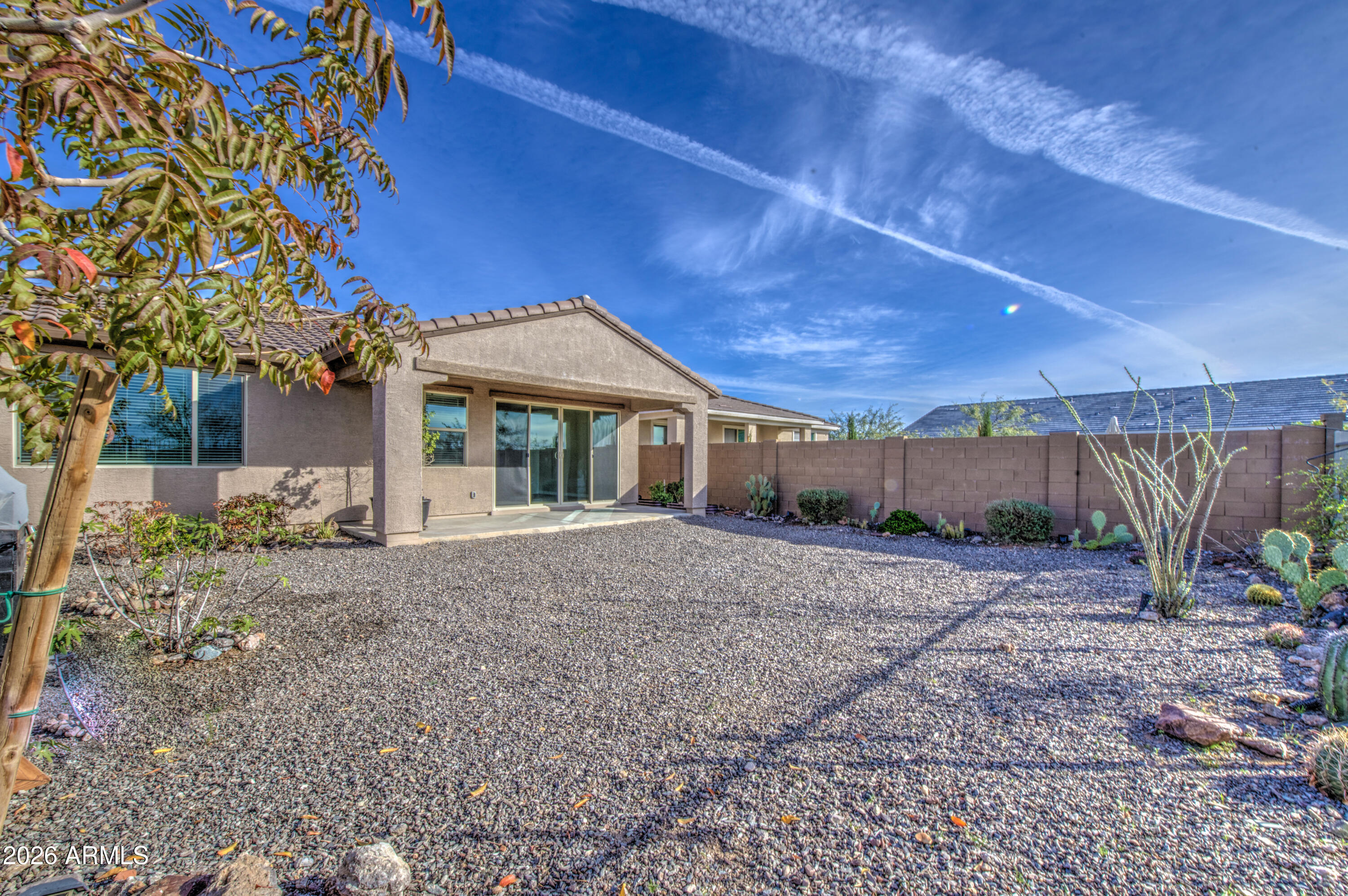 12409 East Soloman Road Gold Canyon, AZ 85118 - Photo 44 of 47 a view of a house with a yard