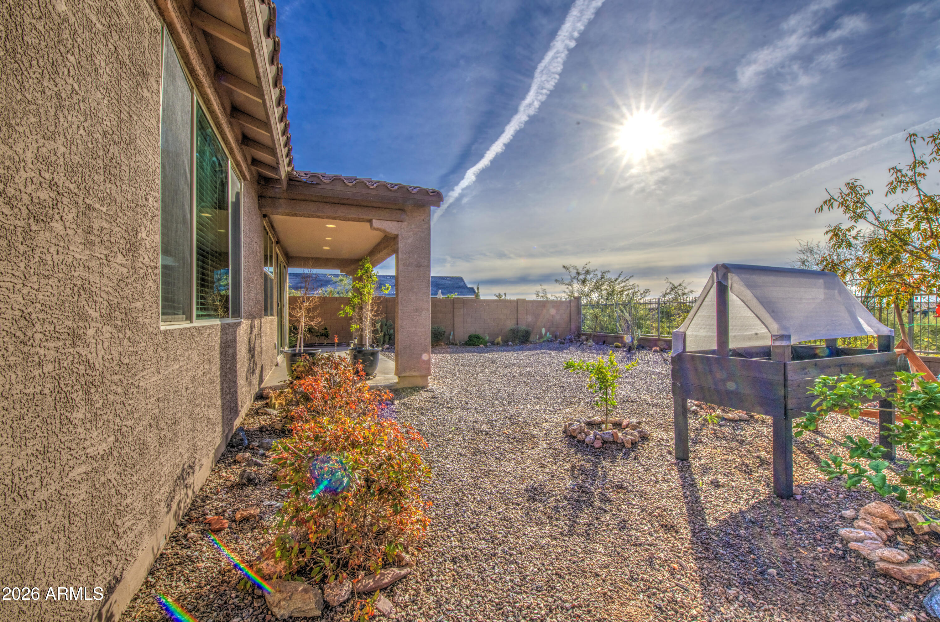 12409 East Soloman Road Gold Canyon, AZ 85118 - Photo 46 of 47 a view of a house with backyard porch and sitting area
