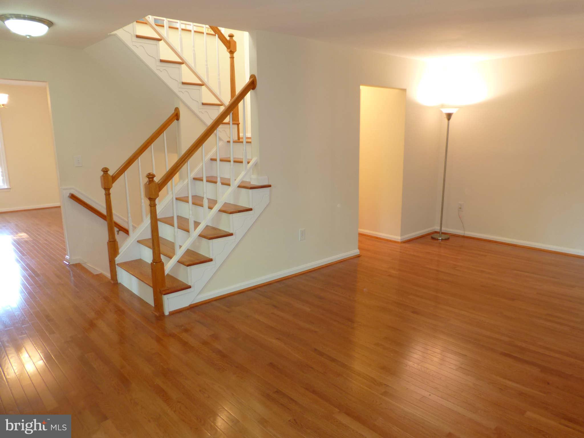 7311 Treetop Hill Lane Springfield, VA 22152 - Photo 2 of 26 a view of an entryway with wooden floor
