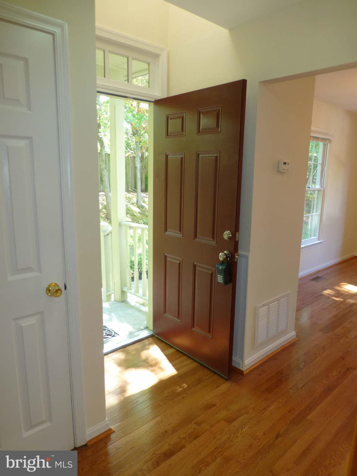 7311 Treetop Hill Lane Springfield, VA 22152 - Photo 11 of 26 a view of entryway with wooden floor
