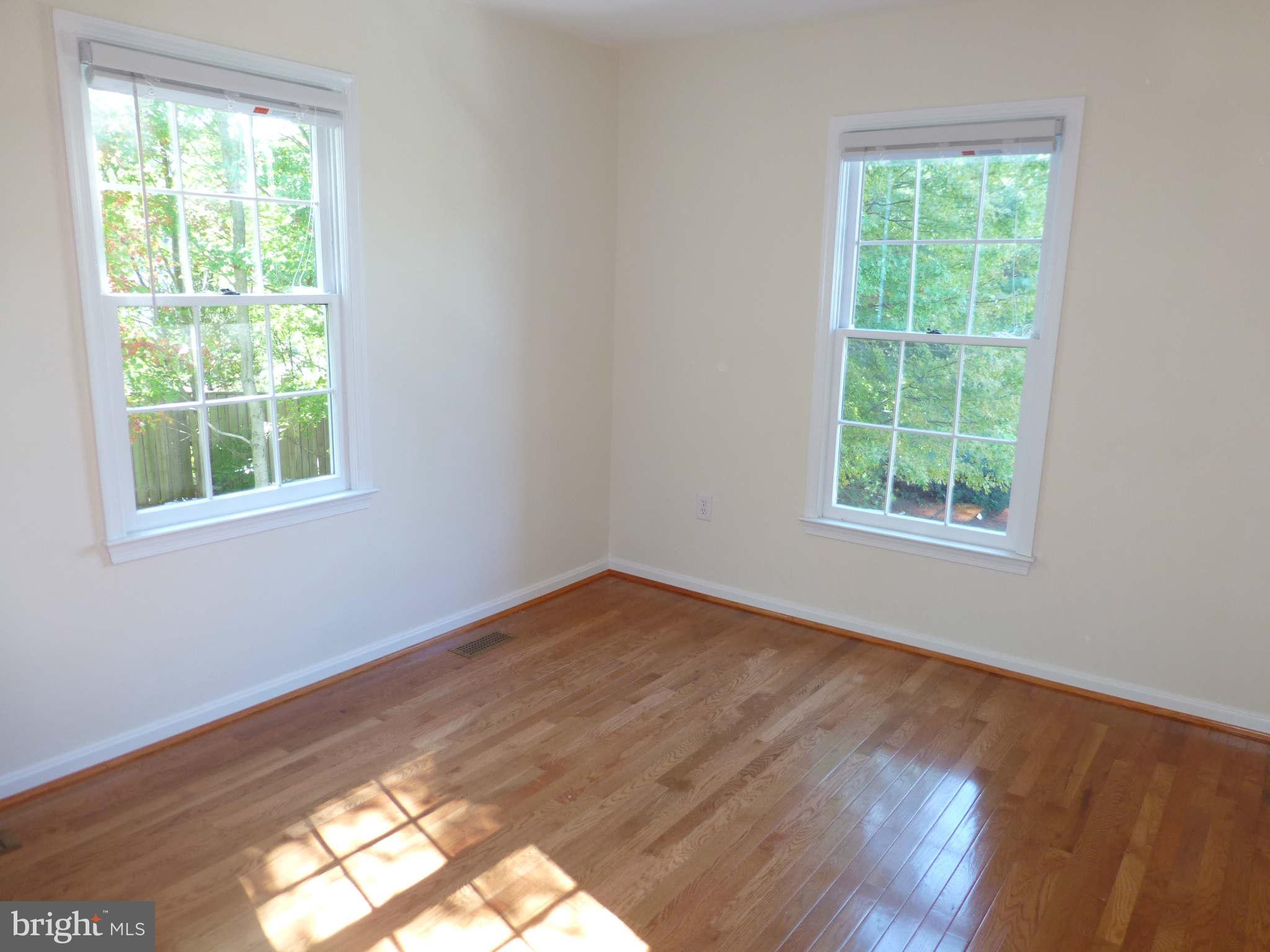 7311 Treetop Hill Lane Springfield, VA 22152 - Photo 16 of 26 an empty room with a window