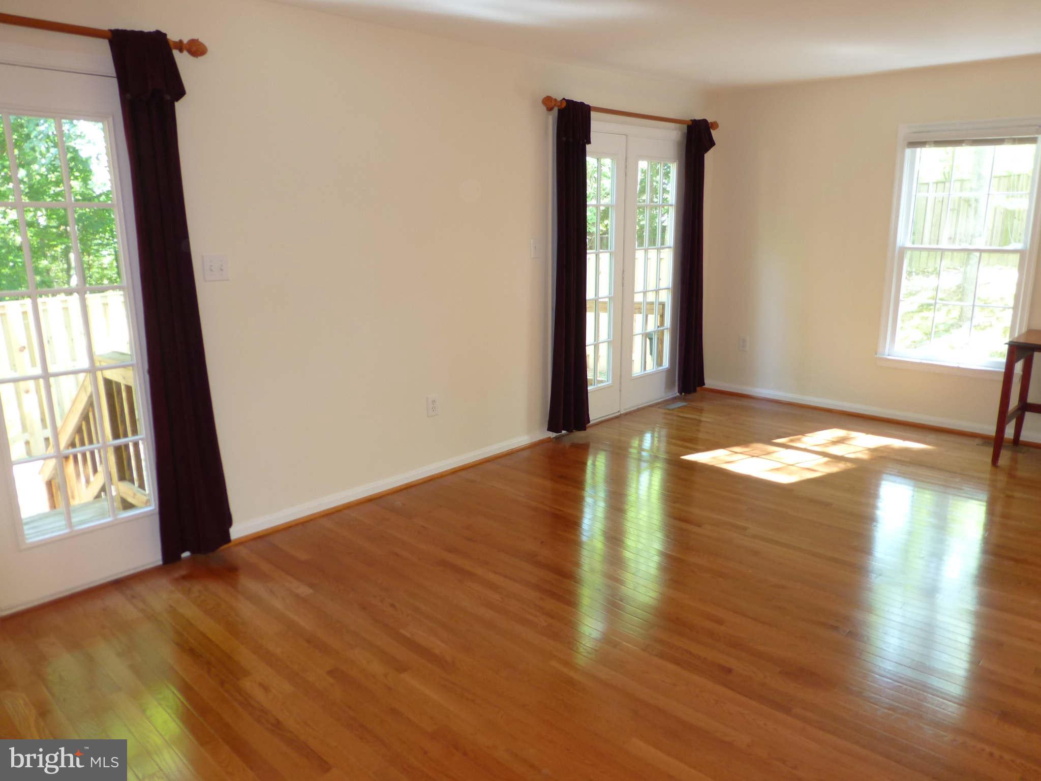 7311 Treetop Hill Lane Springfield, VA 22152 - Photo 4 of 26 a view of an empty room and window